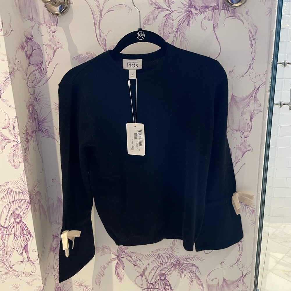Black sweater with bow tying sleeves